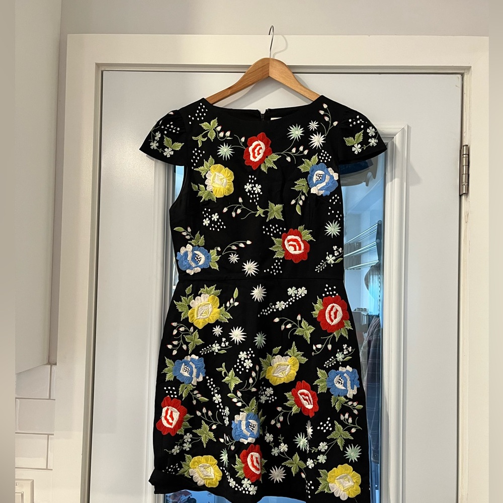 Alice + Olivia black mini dress with colourful embroidery. Stunning fit.